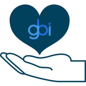 Image of Hand with Heart Hovering Over It - Heart Has GBI Logo Within It